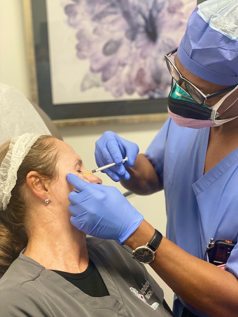 patient receiving dermal fillers face